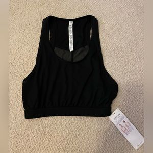 Size small tank. In perfect condition with tags.
